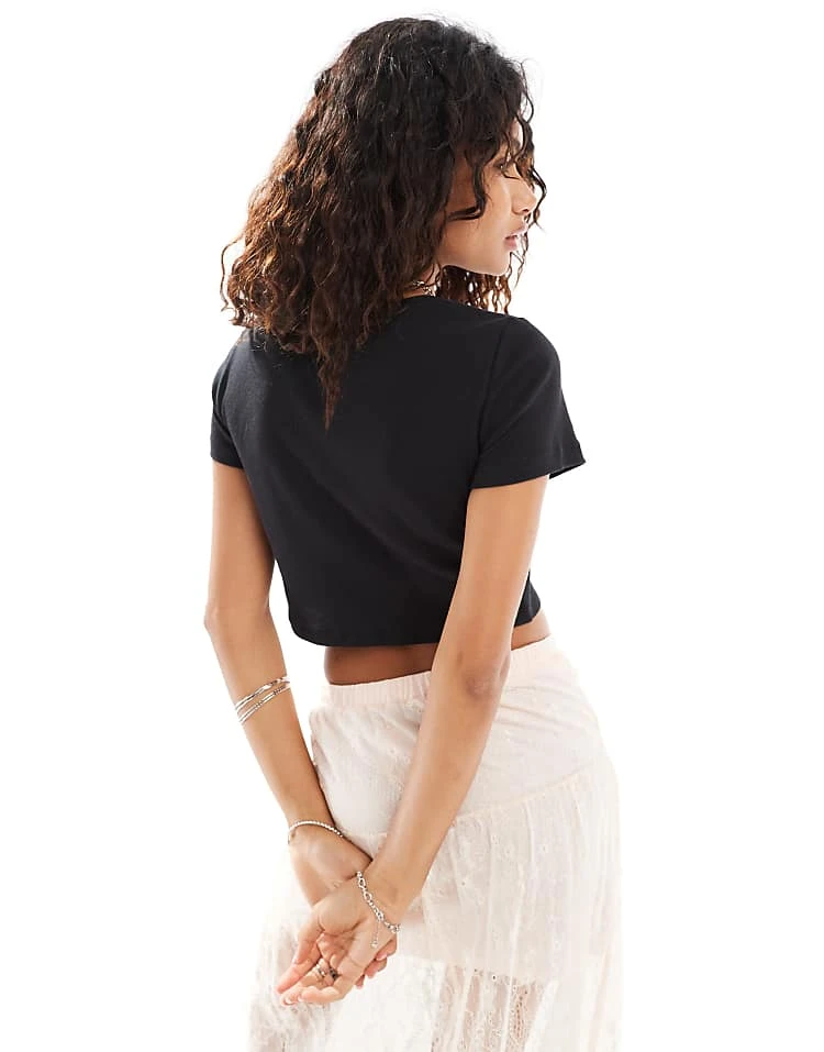 Noisy May Cropped Baby Tee With Flower Cut Out In Black For Women 3 Noisy May Cropped Baby Tee With Flower Cut Out In Black For Women - Image 3