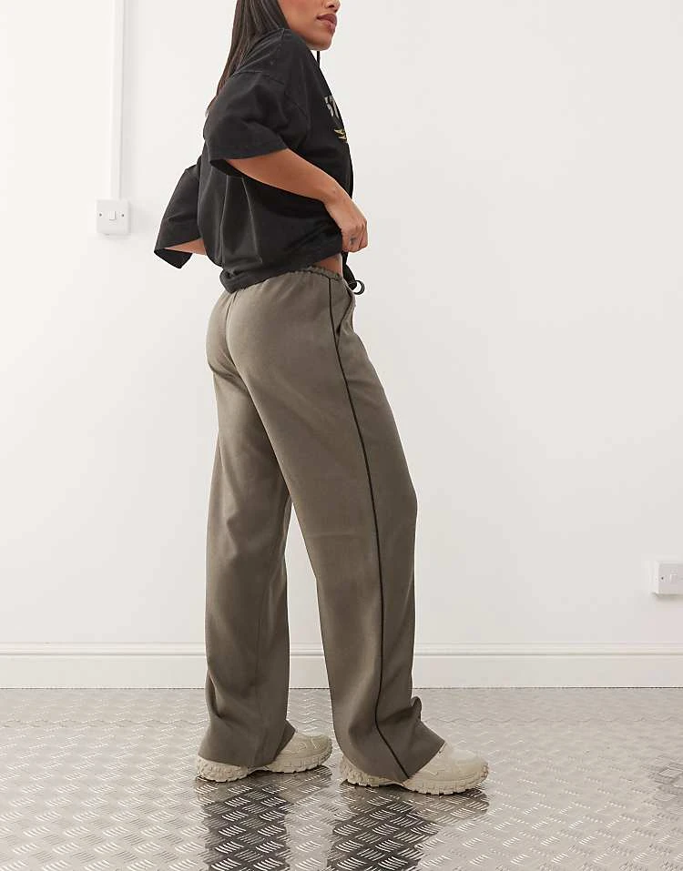 Noisy May String Tie Loose Fit Trousers In Khaki With Black Piping Detail For Women Morel 2 Noisy May String Tie Loose Fit Trousers In Khaki With Black Piping Detail For Women Morel - Image 2