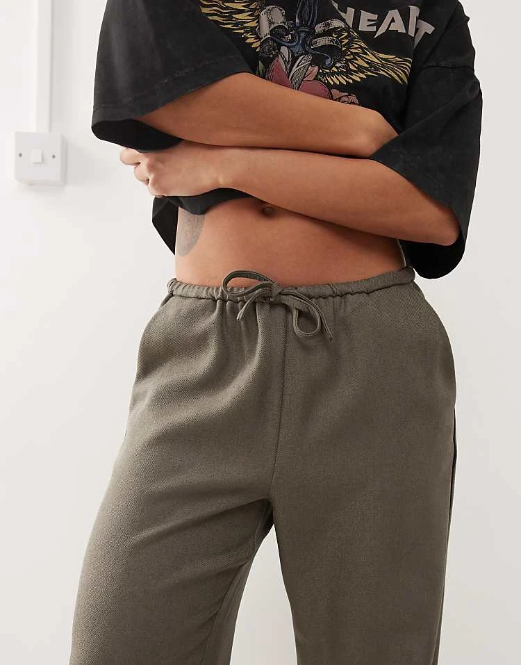 Noisy May String Tie Loose Fit Trousers In Khaki With Black Piping Detail For Women Morel 4 Noisy May String Tie Loose Fit Trousers In Khaki With Black Piping Detail For Women Morel - Image 4